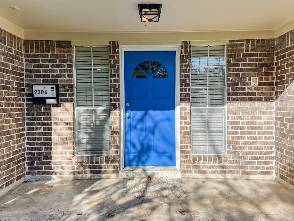 9206 Sharpview Drive Houston, TX 77036 - Photo 26 of 27 a view of front door of house