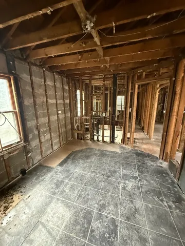 a view of porch with a ceiling fan