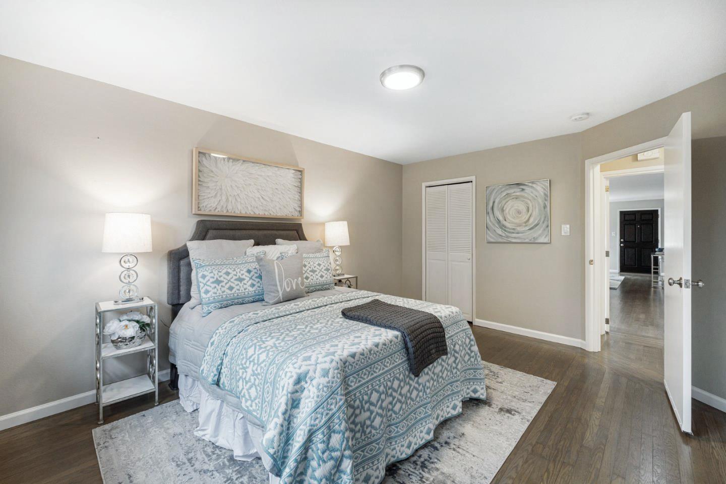 374 Bancroft Way Pacifica, CA 94044 - Photo 14 of 23 a bedroom with a bed and a mirror