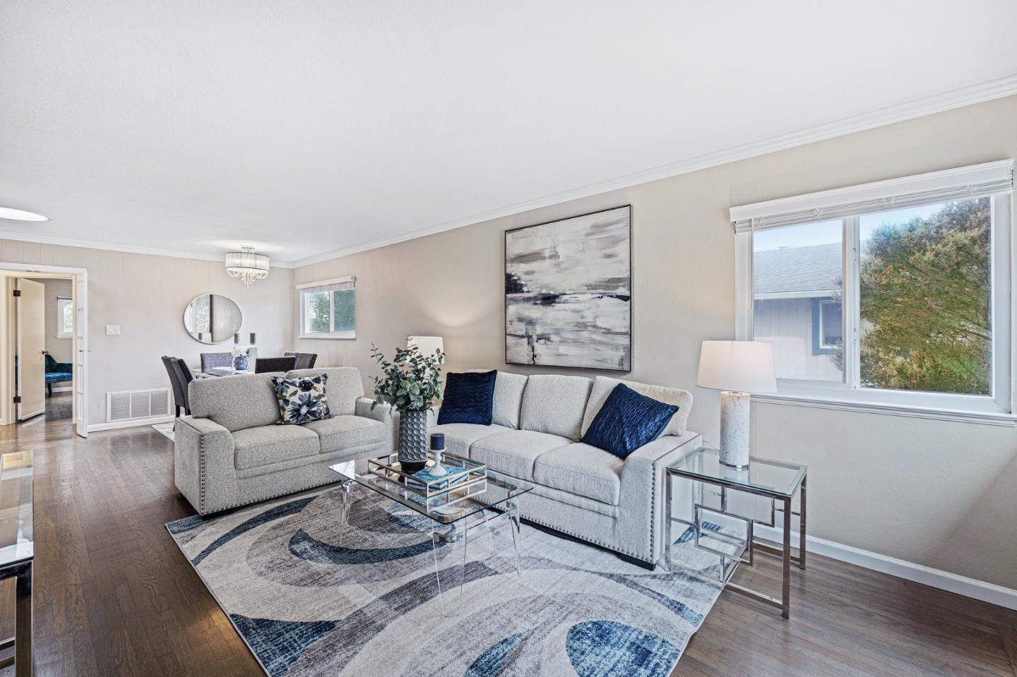 374 Bancroft Way Pacifica, CA 94044 - Photo 3 of 23 a living room with furniture and a large window
