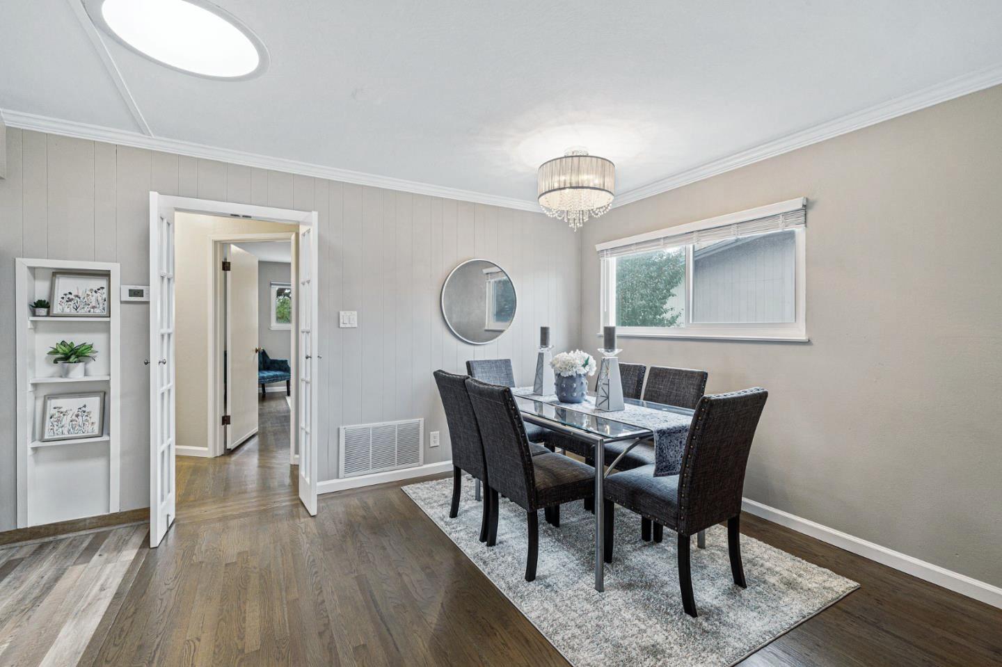 374 Bancroft Way Pacifica, CA 94044 - Photo 6 of 23 a view of a dining room with furniture window and wooden floor