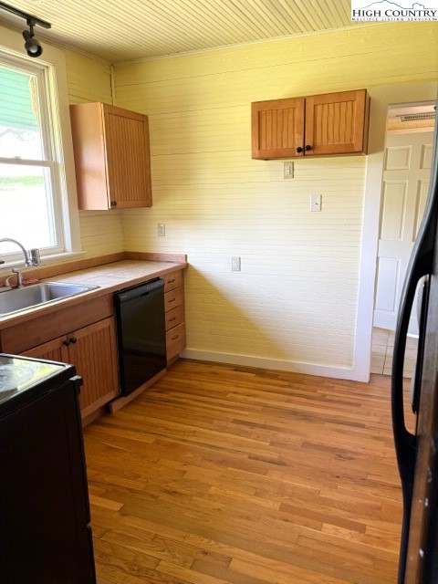 23 Millards Way Sparta, NC 28675 - Photo 12 of 46 a bathroom with a sink and a mirror