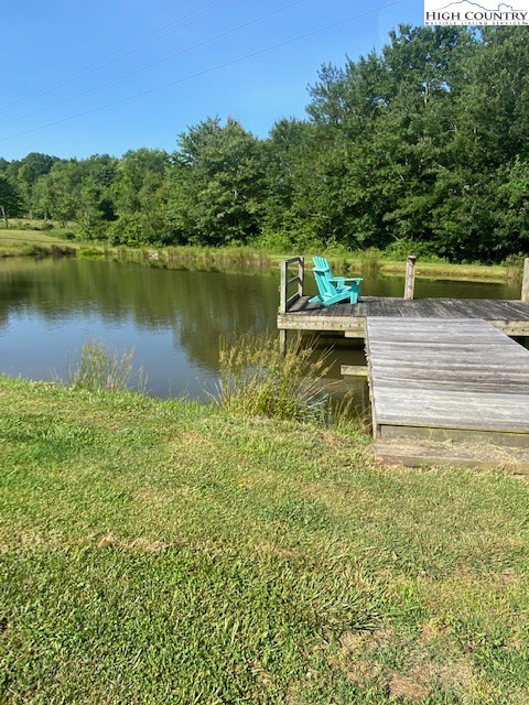 23 Millards Way Sparta, NC 28675 - Photo 14 of 46 a view of a lake view with houses in back