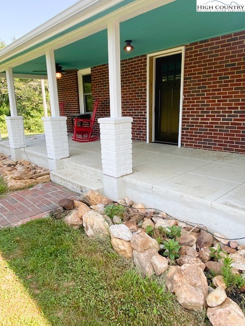 23 Millards Way Sparta, NC 28675 - Photo 15 of 46 a front view of a house with a yard