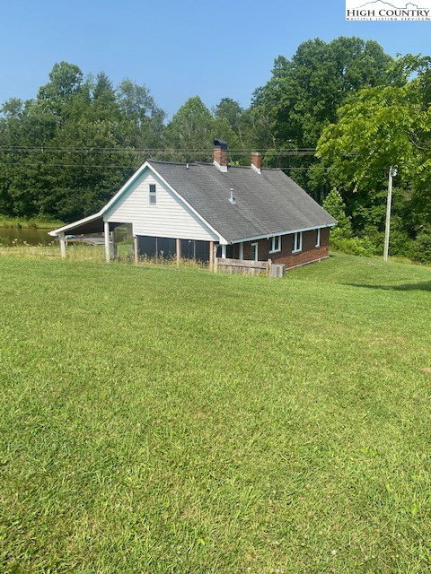 23 Millards Way Sparta, NC 28675 - Photo 23 of 46 a aerial view of a house with a big yard and large trees