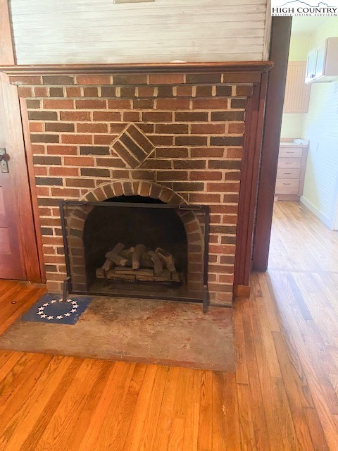 23 Millards Way Sparta, NC 28675 - Photo 37 of 46 a view of fireplace and wooden floor