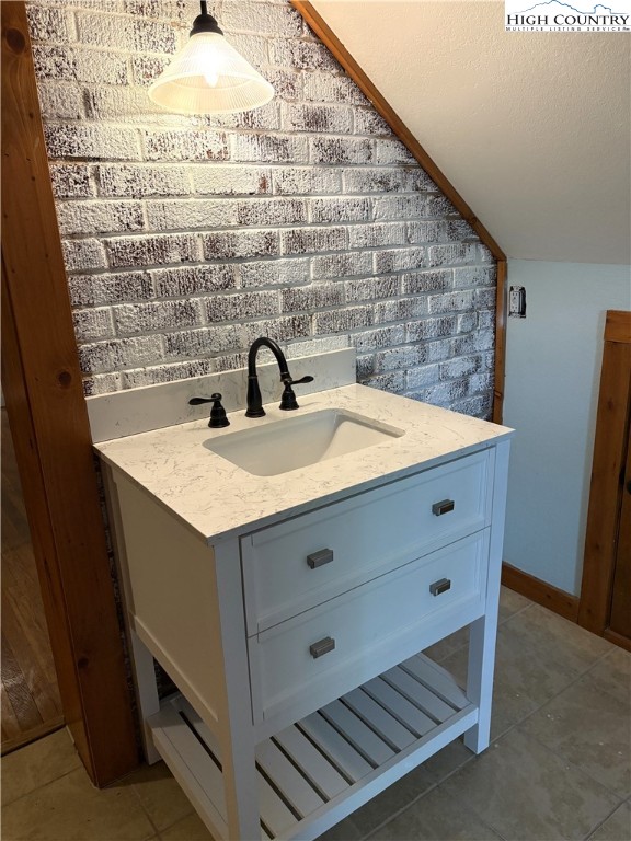 23 Millards Way Sparta, NC 28675 - Photo 8 of 46 a bathroom with a sink and a mirror