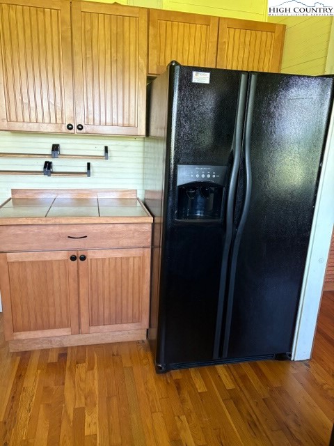 23 Millards Way Sparta, NC 28675 - Photo 10 of 46 a kitchen with a refrigerator and a sink