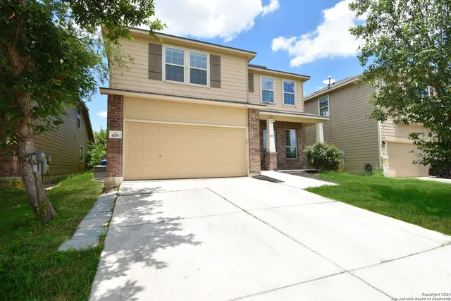 a front view of house with yard