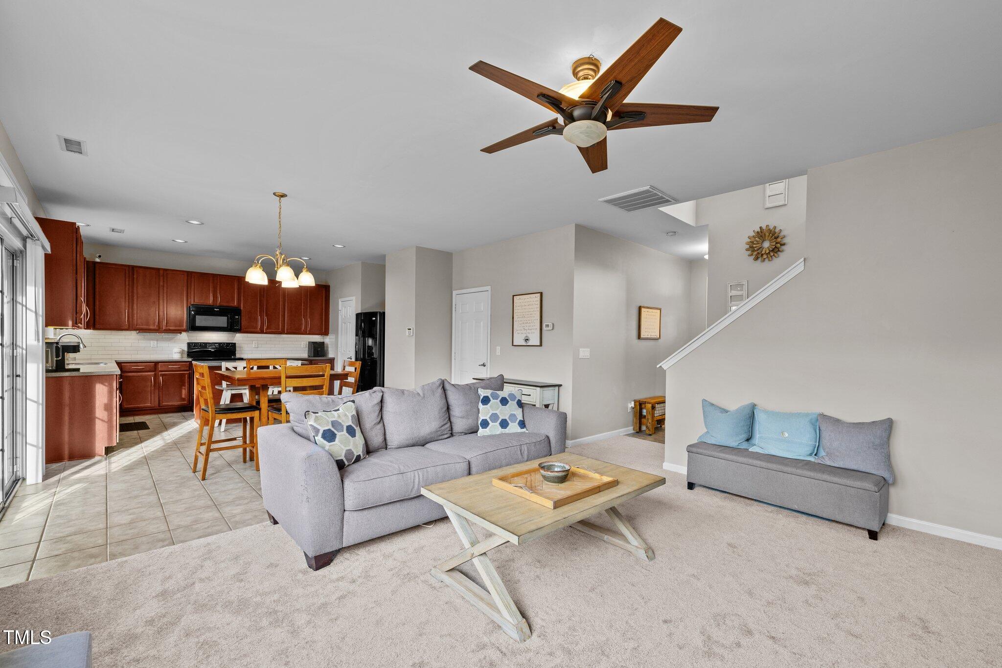 200 Ryder Cup Circle Raleigh, NC 27603 - Photo 8 of 50 a living room with furniture and kitchen view