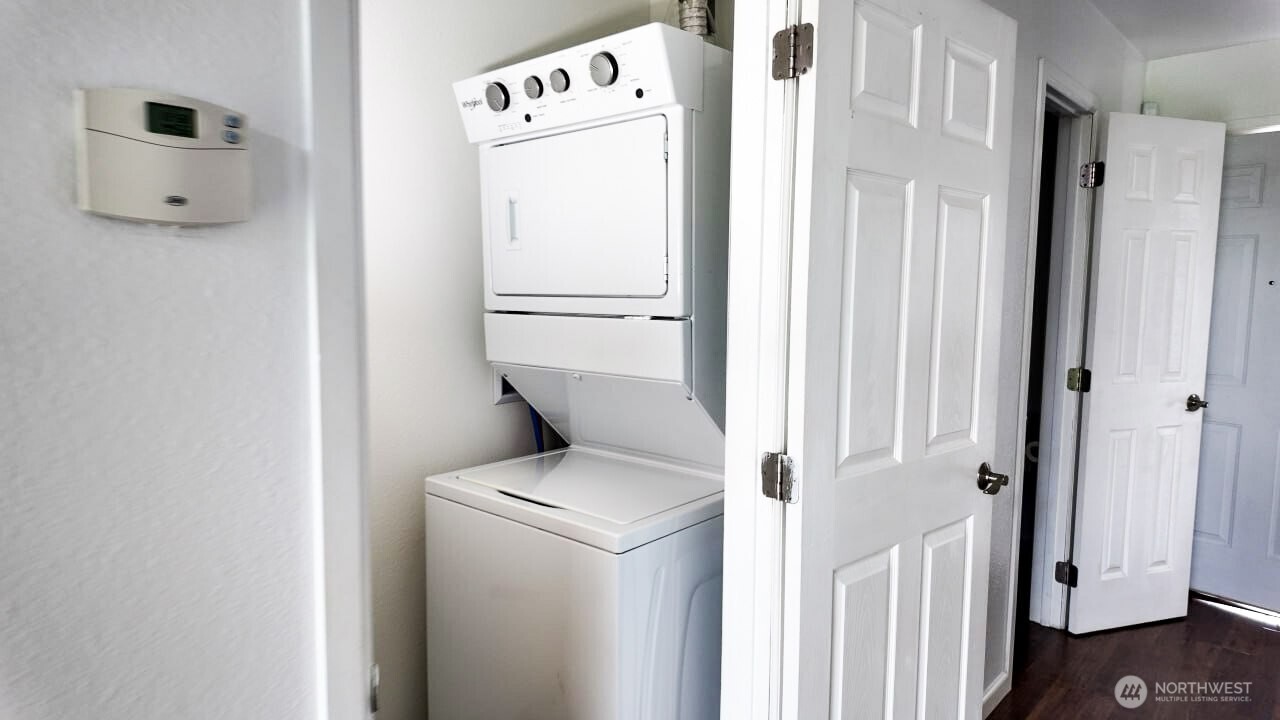 10601 Southeast 252nd Street, Unit O2 Kent, WA 98030 - Photo 9 of 18 a utility room with dryer and washer
