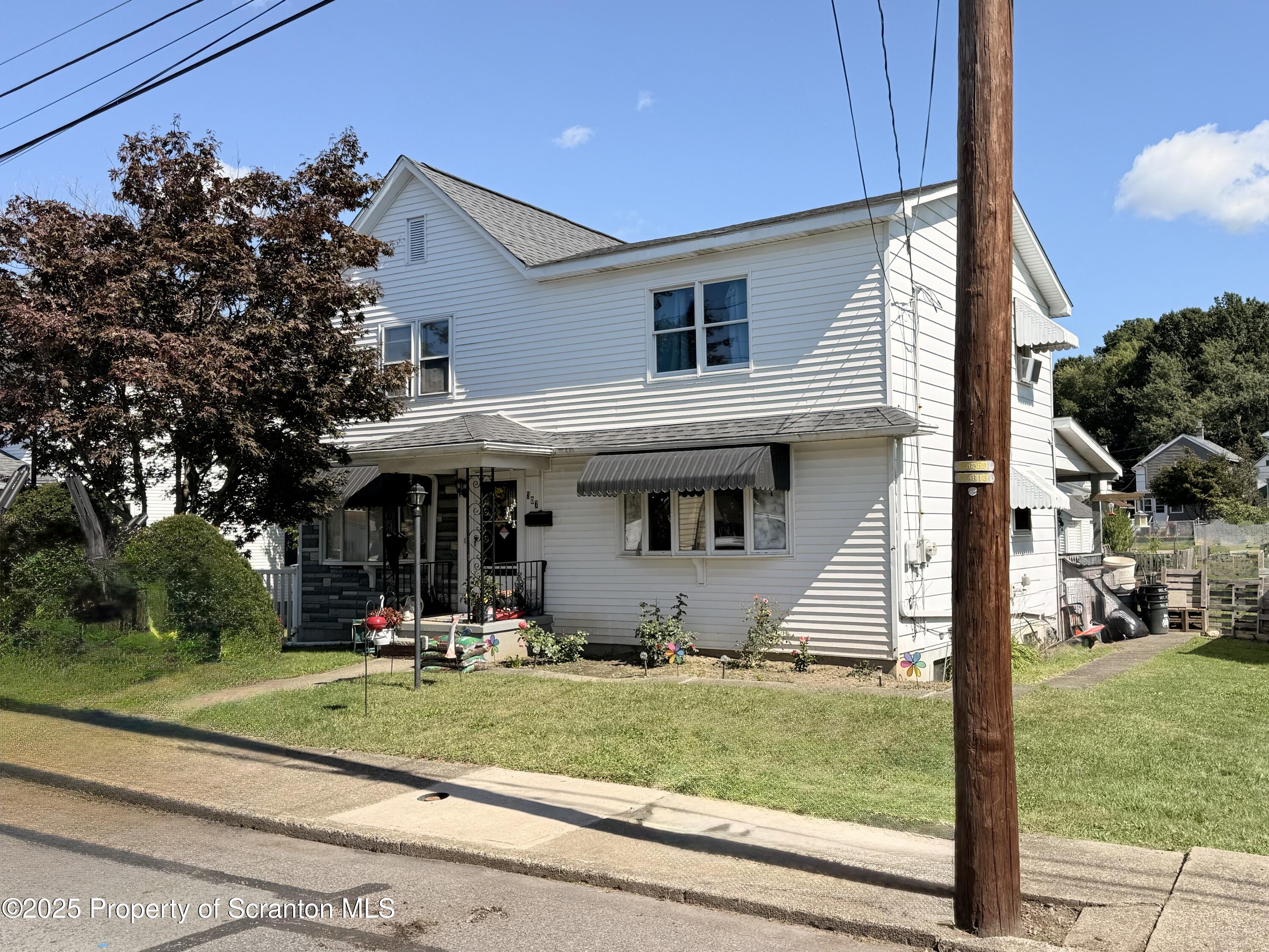 307 Charles Street Old Forge, PA 18518 - Photo 2 of 13 a view of a house with backyard porch and sitting area