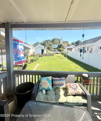 a room with lots of furniture and clutter