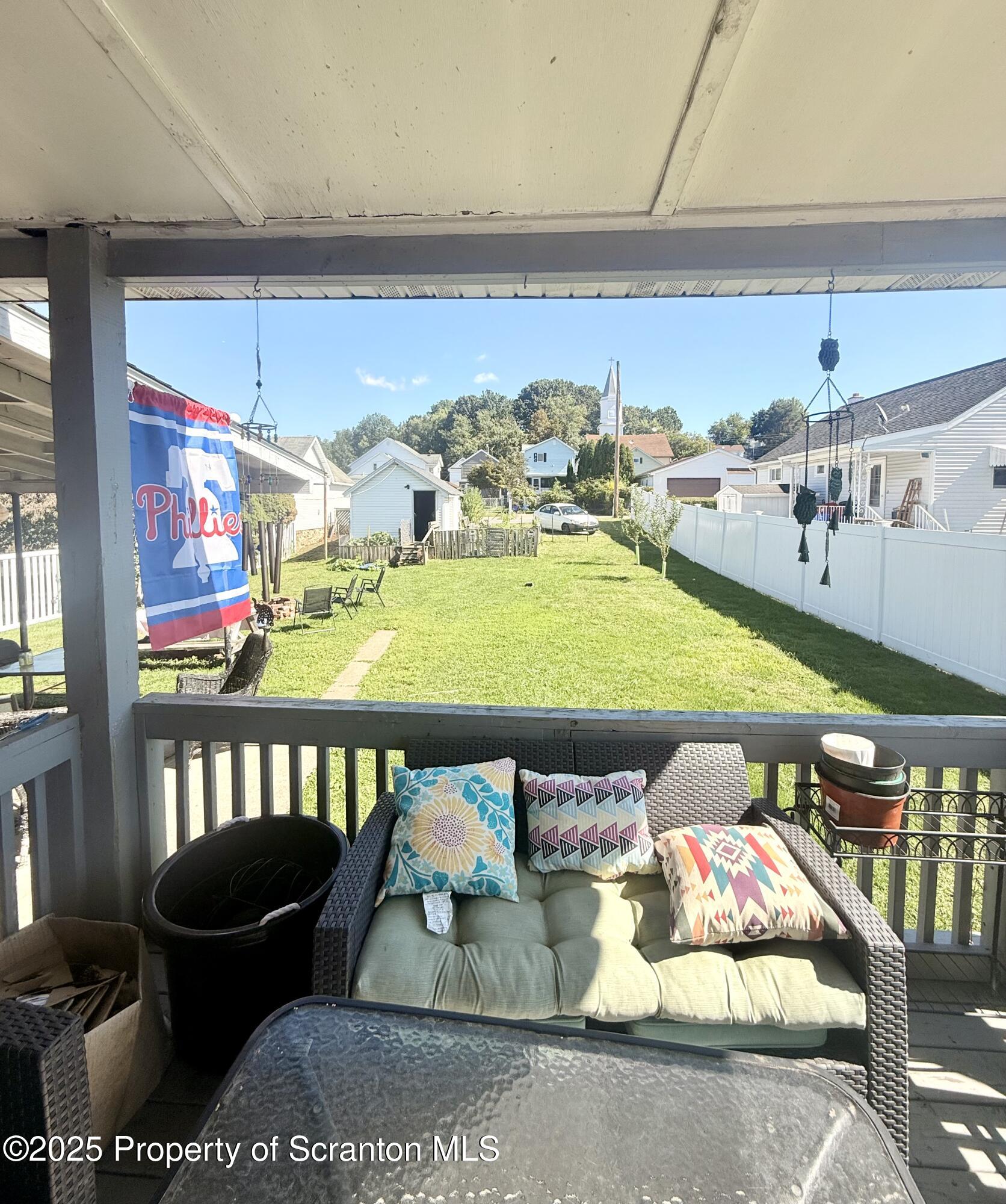 307 Charles Street Old Forge, PA 18518 - Photo 4 of 13 a room with lots of furniture and clutter