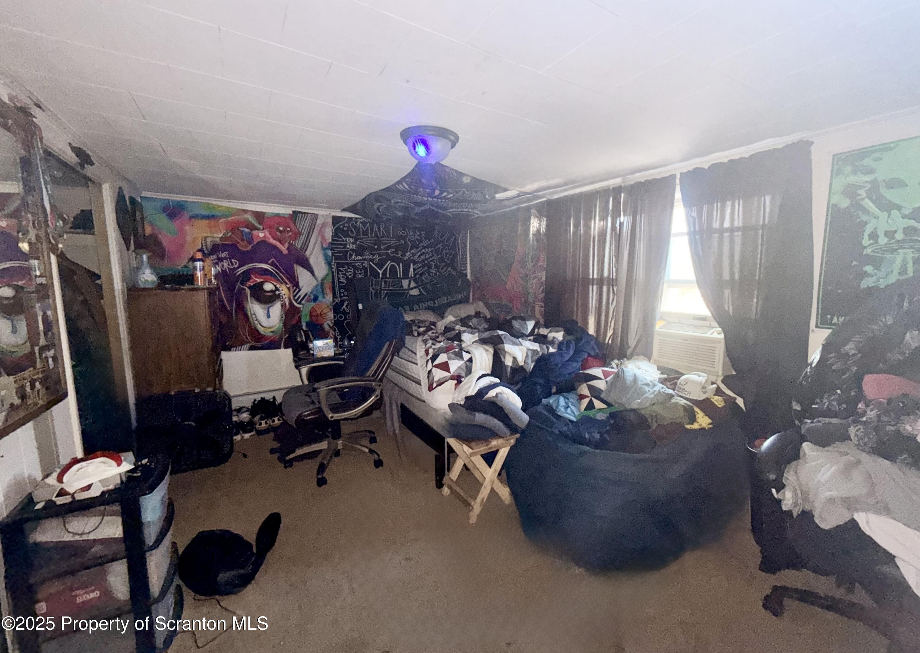 307 Charles Street Old Forge, PA 18518 - Photo 10 of 13 a living room with furniture window and a flat screen tv