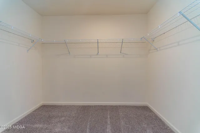 a view of a room with racks on the wall