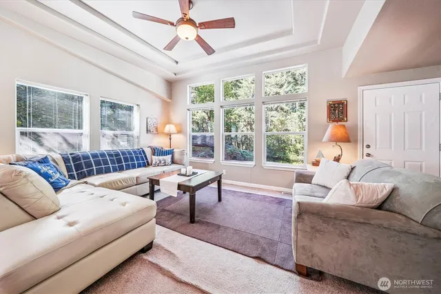a living room with furniture and a window