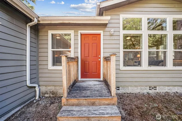 a front view of a house with a porch