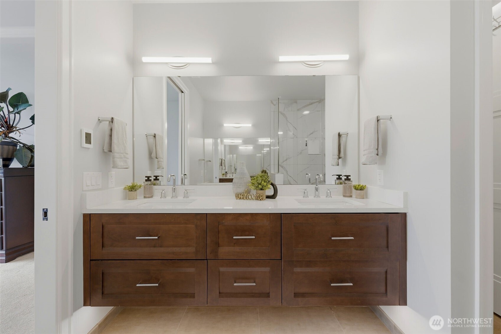 4907 Main Street, Unit 214 Tacoma, WA 98407 - Photo 12 of 34 a bathroom with a sink double vanity and a mirror