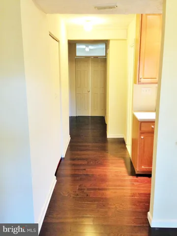 a kitchen with a sink a stove and a refrigerator