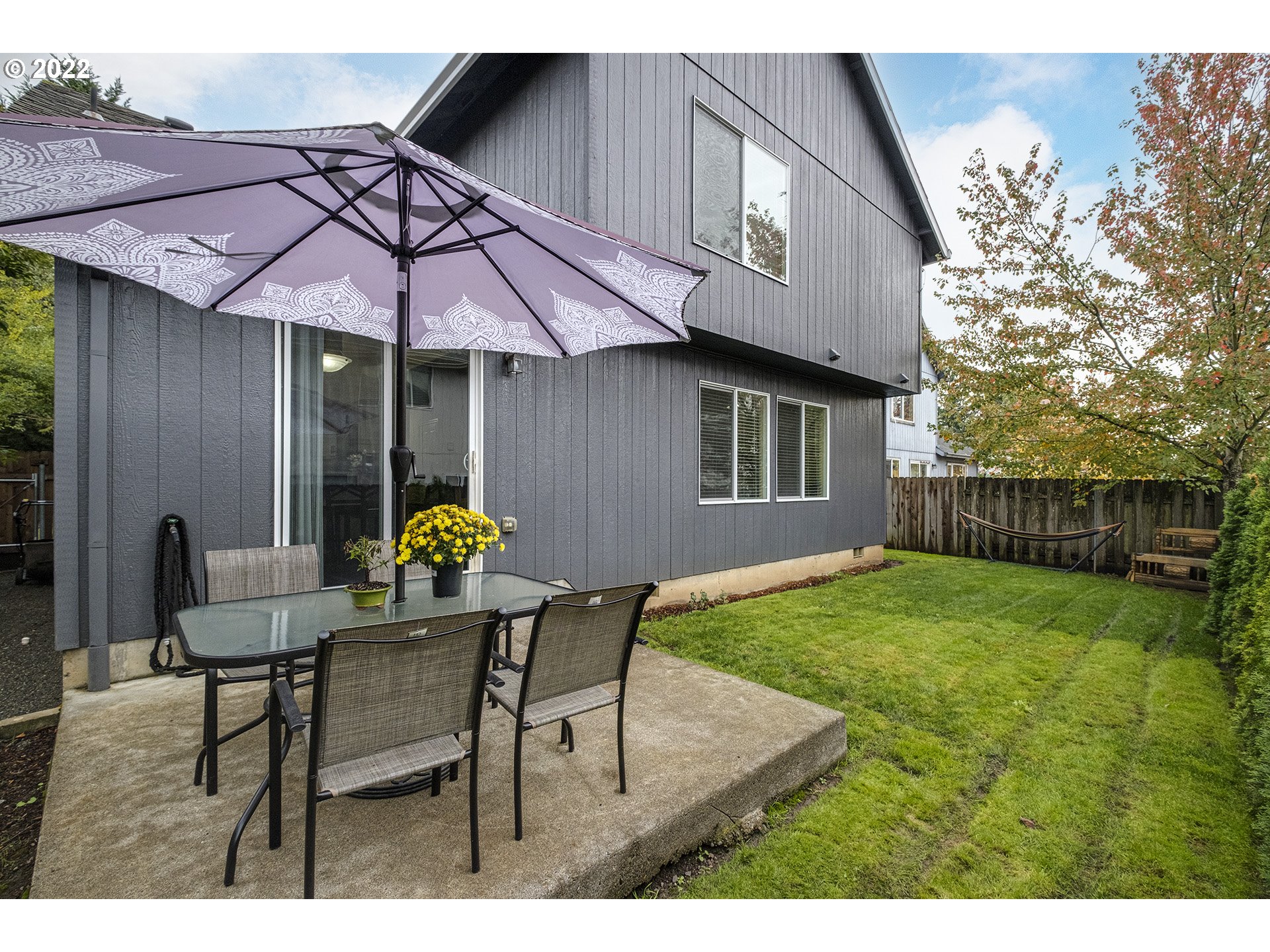 40348 Therese Street Sandy, OR 97055 - Photo 25 of 28 a backyard of a house with table and chairs