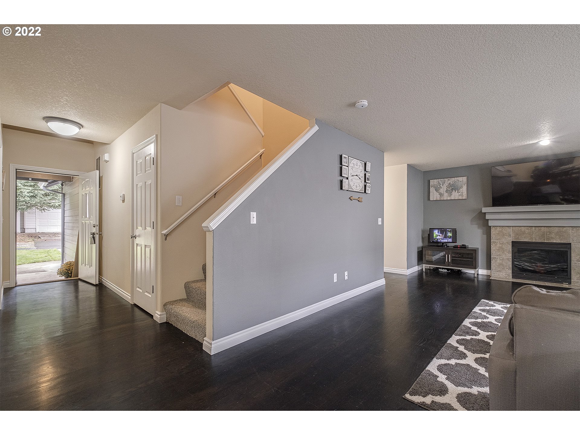 40348 Therese Street Sandy, OR 97055 - Photo 3 of 28 a living room with furniture and a fireplace