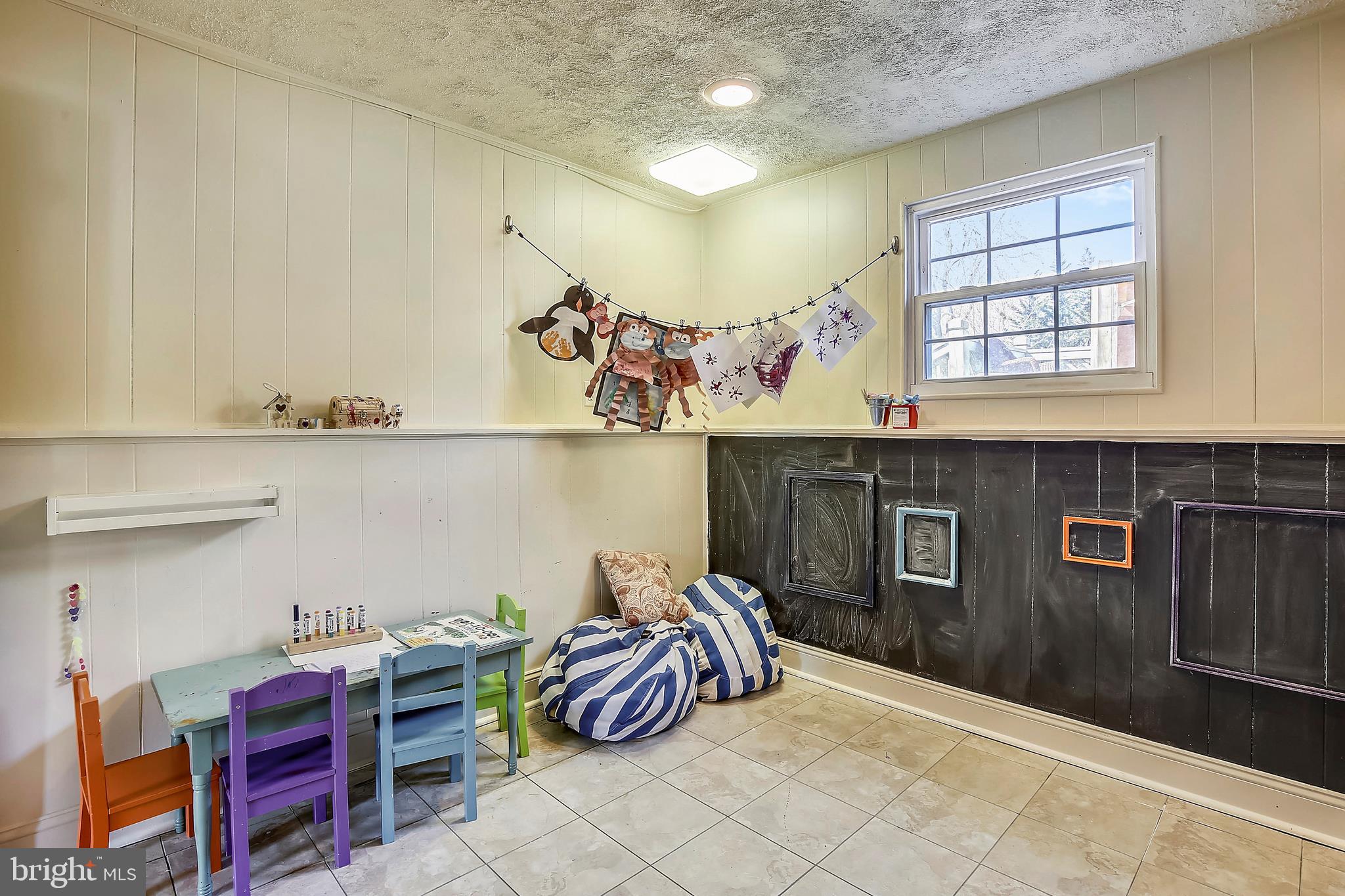 17324 Whitaker Road Poolesville, MD 20837 - Photo 27 of 32 Downstairs play room with built in chalkboard!