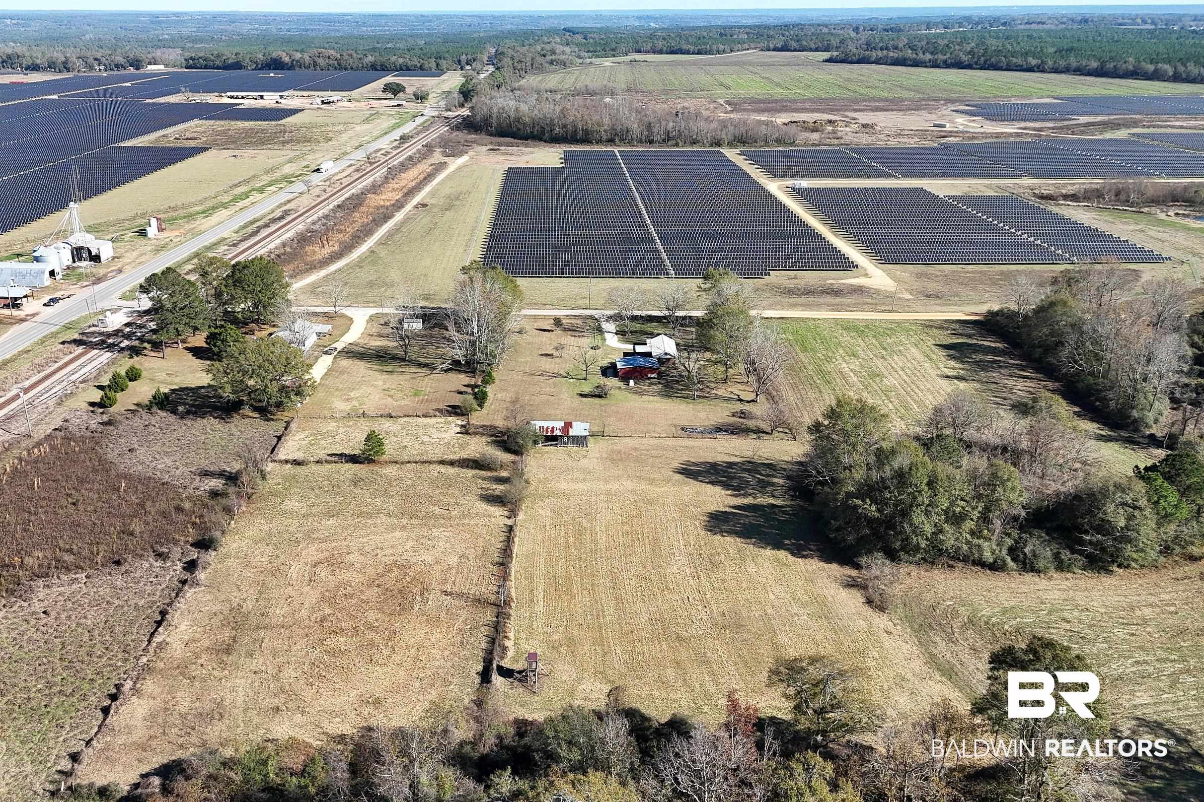 110 Sam Jones Road Atmore, AL 36502 - Photo 35 of 47 Aerial view of property's location featuring rural landscape and large plots for crops