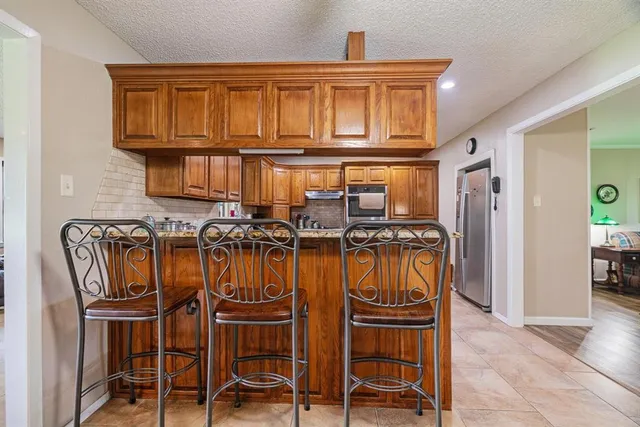 a view of a chairs in kitchen