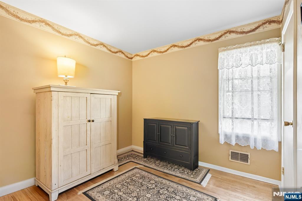 8 Lynn Boulevard Hazlet, NJ 07730 - Photo 12 of 25 a bathroom with a shower and a window