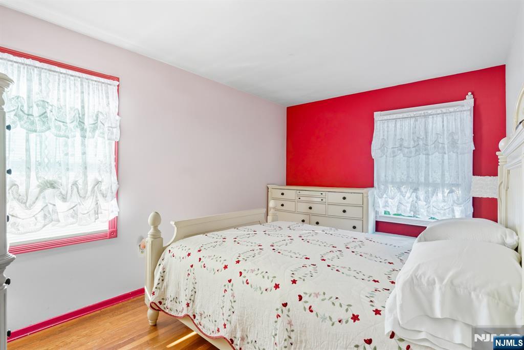 8 Lynn Boulevard Hazlet, NJ 07730 - Photo 13 of 25 a bedroom with a bed and a window