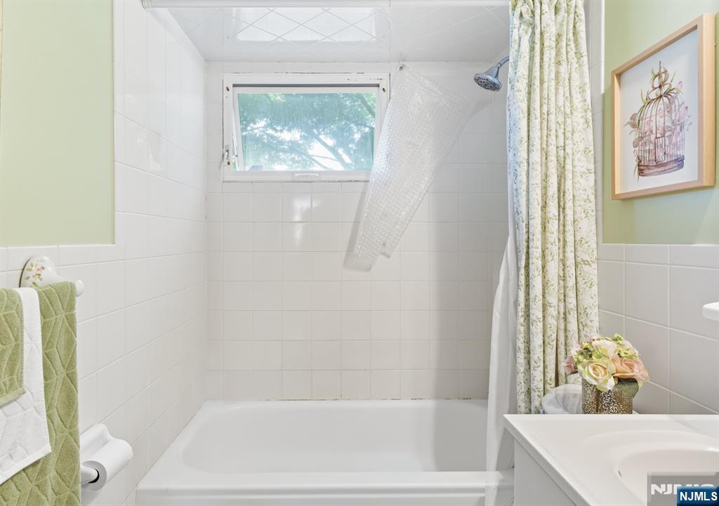 8 Lynn Boulevard Hazlet, NJ 07730 - Photo 16 of 25 a bathroom with a bathtub and shower