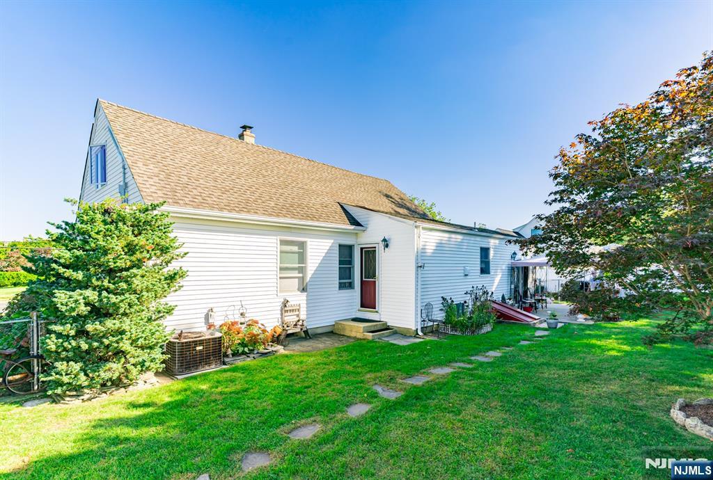 8 Lynn Boulevard Hazlet, NJ 07730 - Photo 24 of 25 a view of a house with backyard and garden