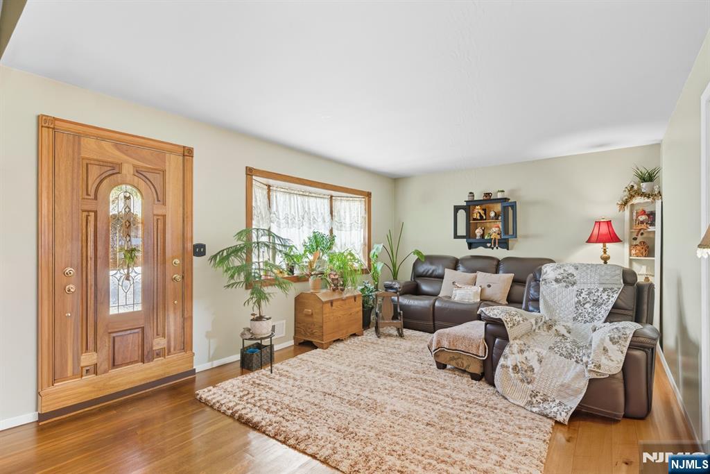 8 Lynn Boulevard Hazlet, NJ 07730 - Photo 6 of 25 a living room with furniture and a window