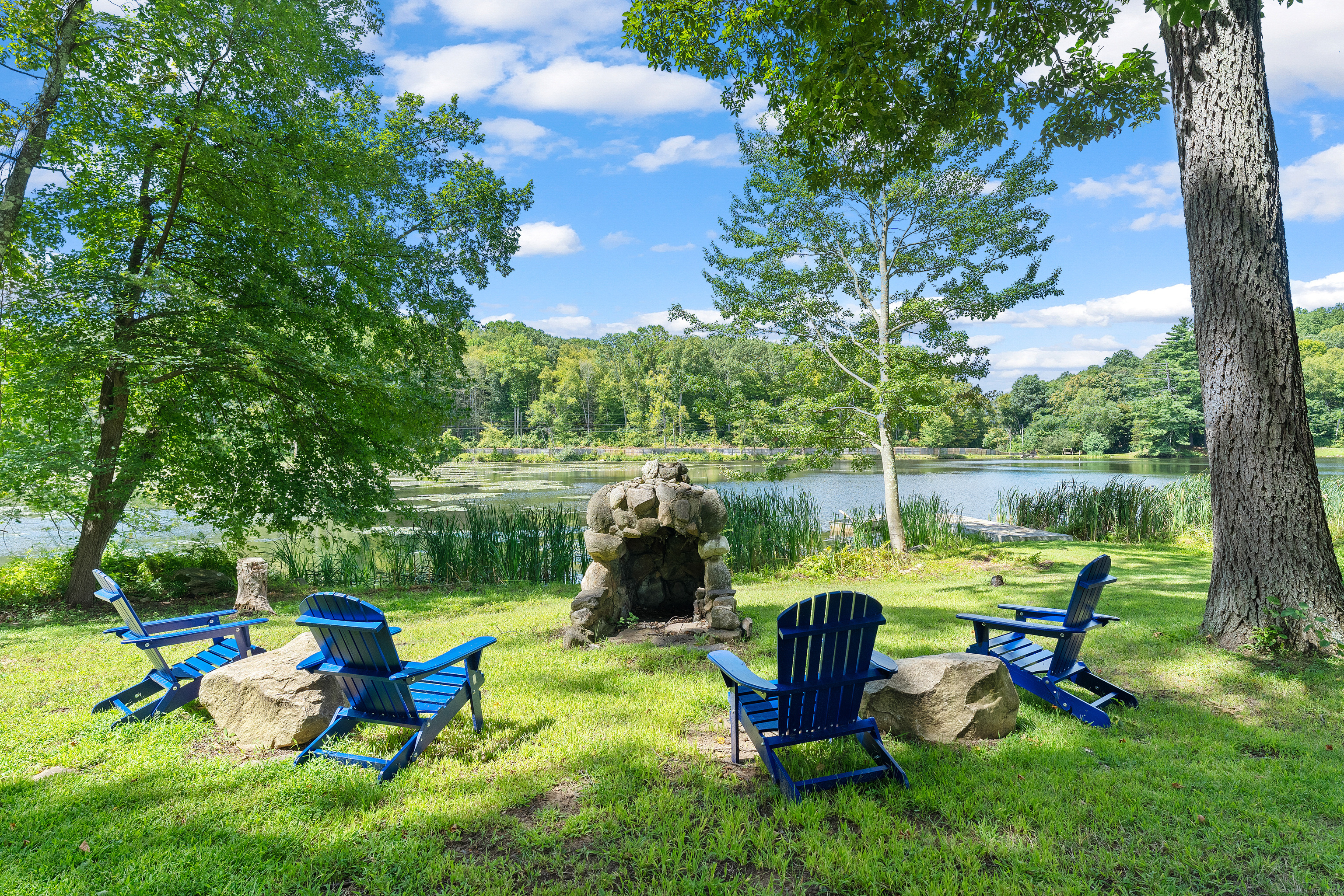 62 Big Bear Hill Road New Milford, CT 06776 - Photo 23 of 40 a garden view with a sitting space