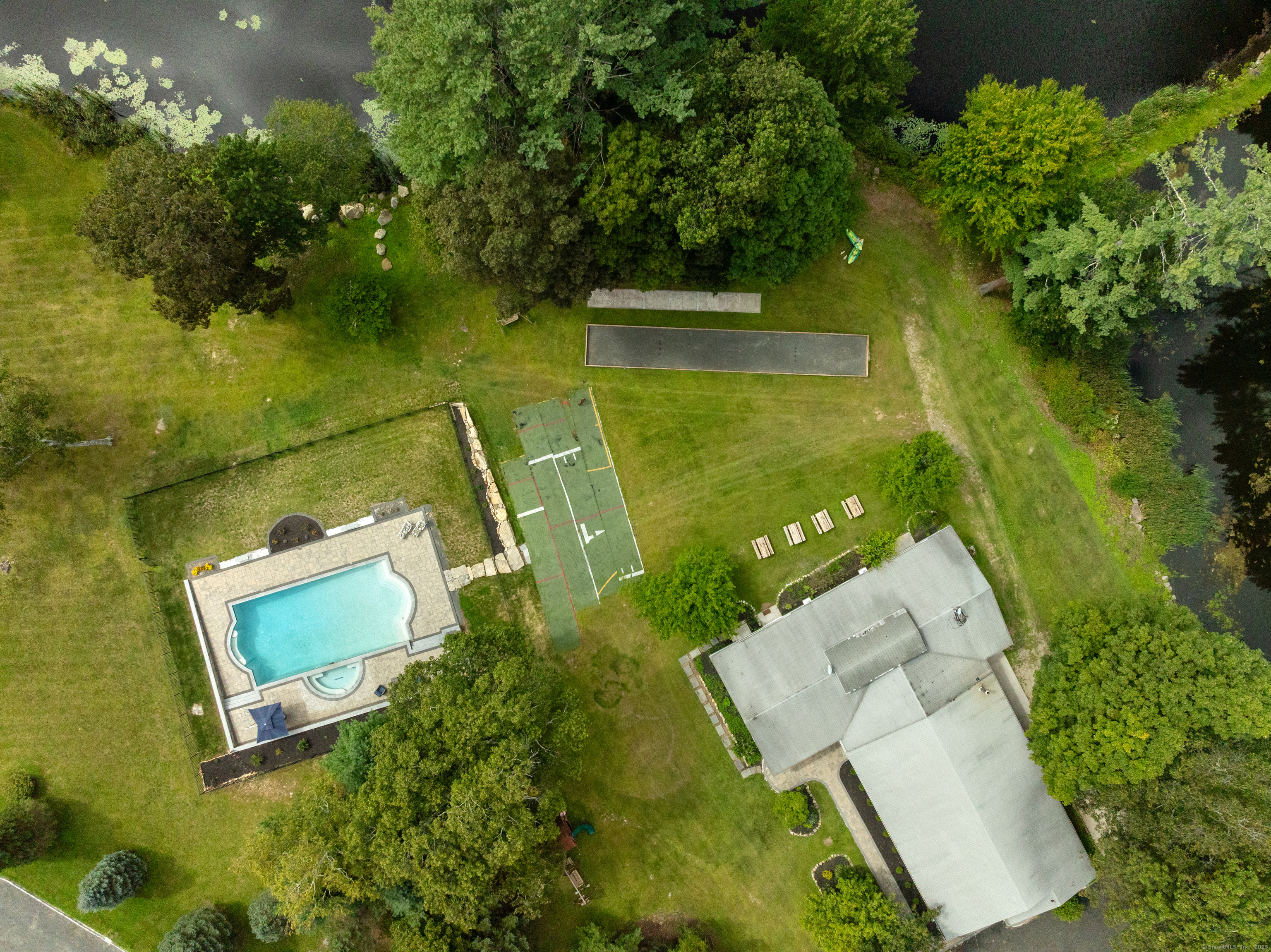 62 Big Bear Hill Road New Milford, CT 06776 - Photo 35 of 40 an aerial view of a house with a yard and lake view