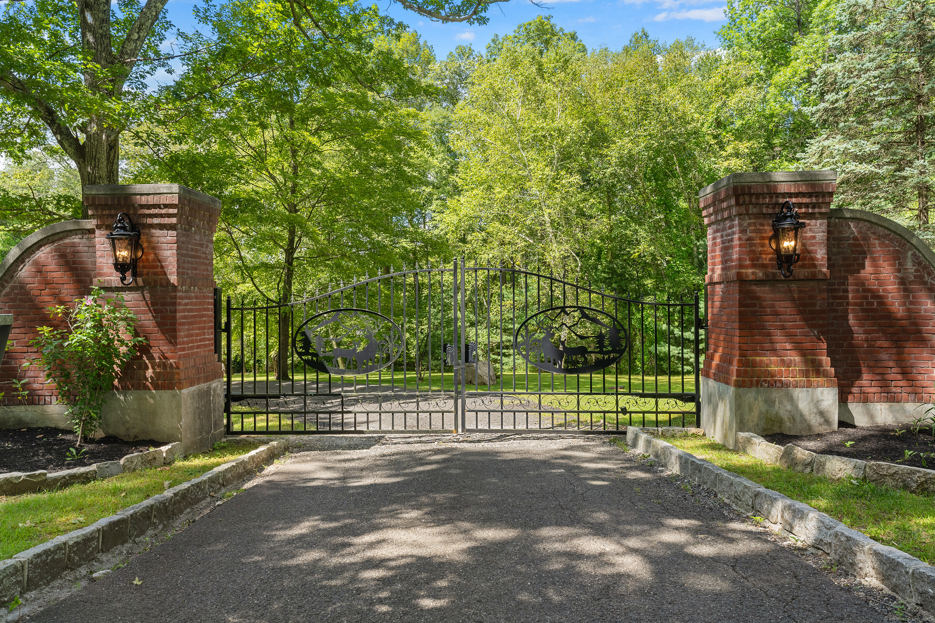 62 Big Bear Hill Road New Milford, CT 06776 - Photo 5 of 40 a view of a house with a small yard and a large tree