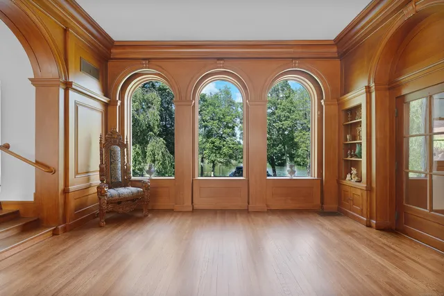 a view of front door with wooden floor