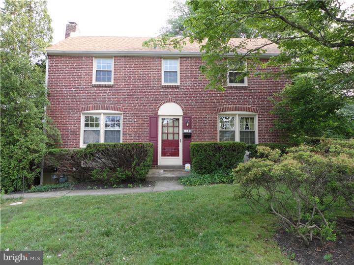 642 Dutton Circle Springfield, PA 19064 - Photo 1 of 25 a front view of a house with a yard