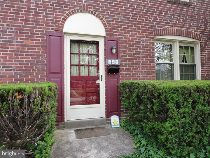 642 Dutton Circle Springfield, PA 19064 - Photo 6 of 25 a front view of a house with a garden