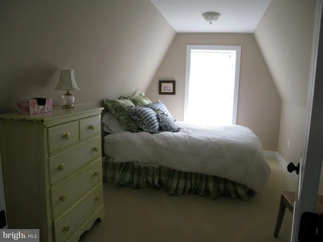 a bathroom with a sink vanity and mirror