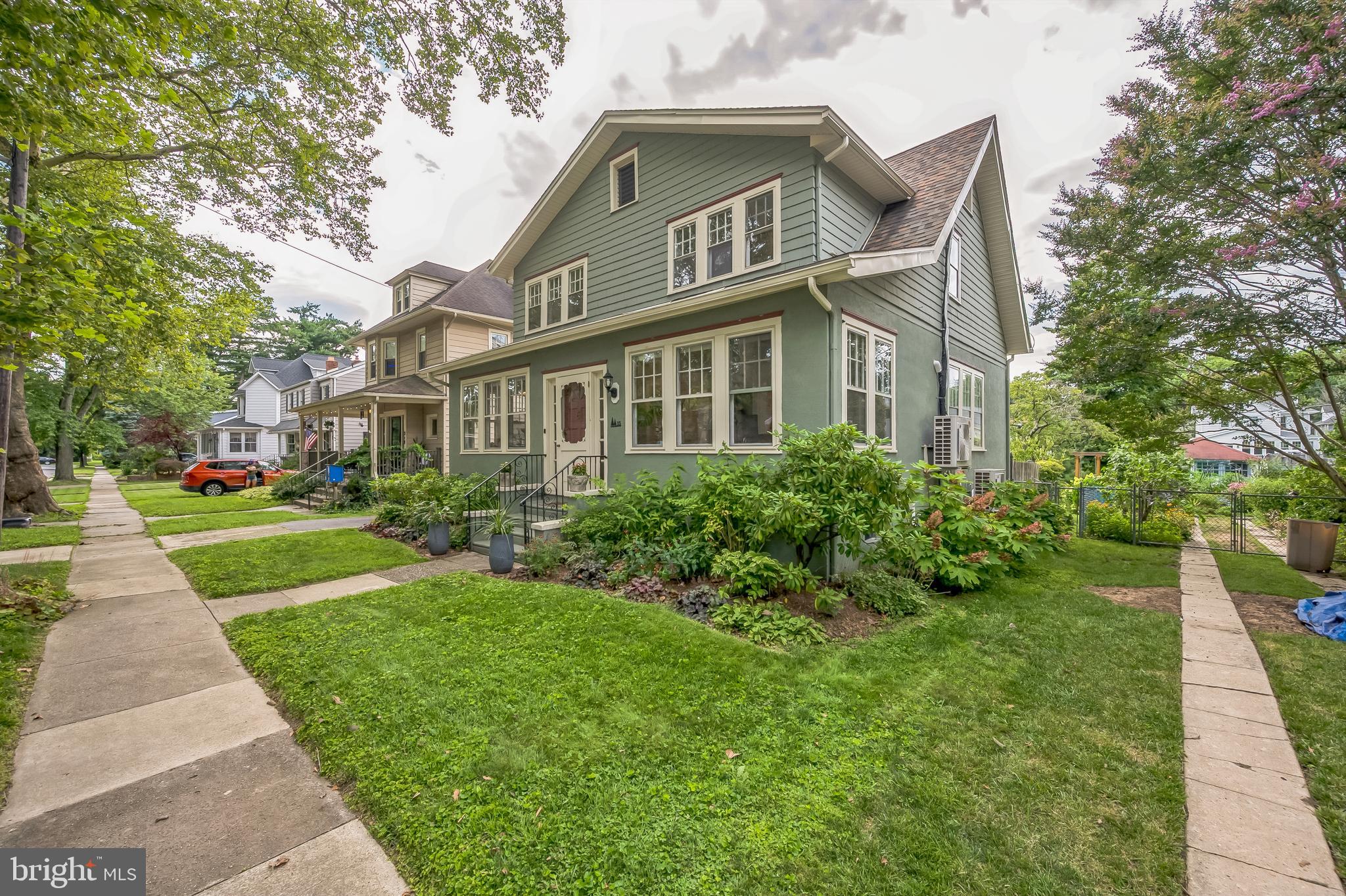 35 Harvard Road Audubon, NJ 08106 - Photo 2 of 36 a front view of a house with a yard