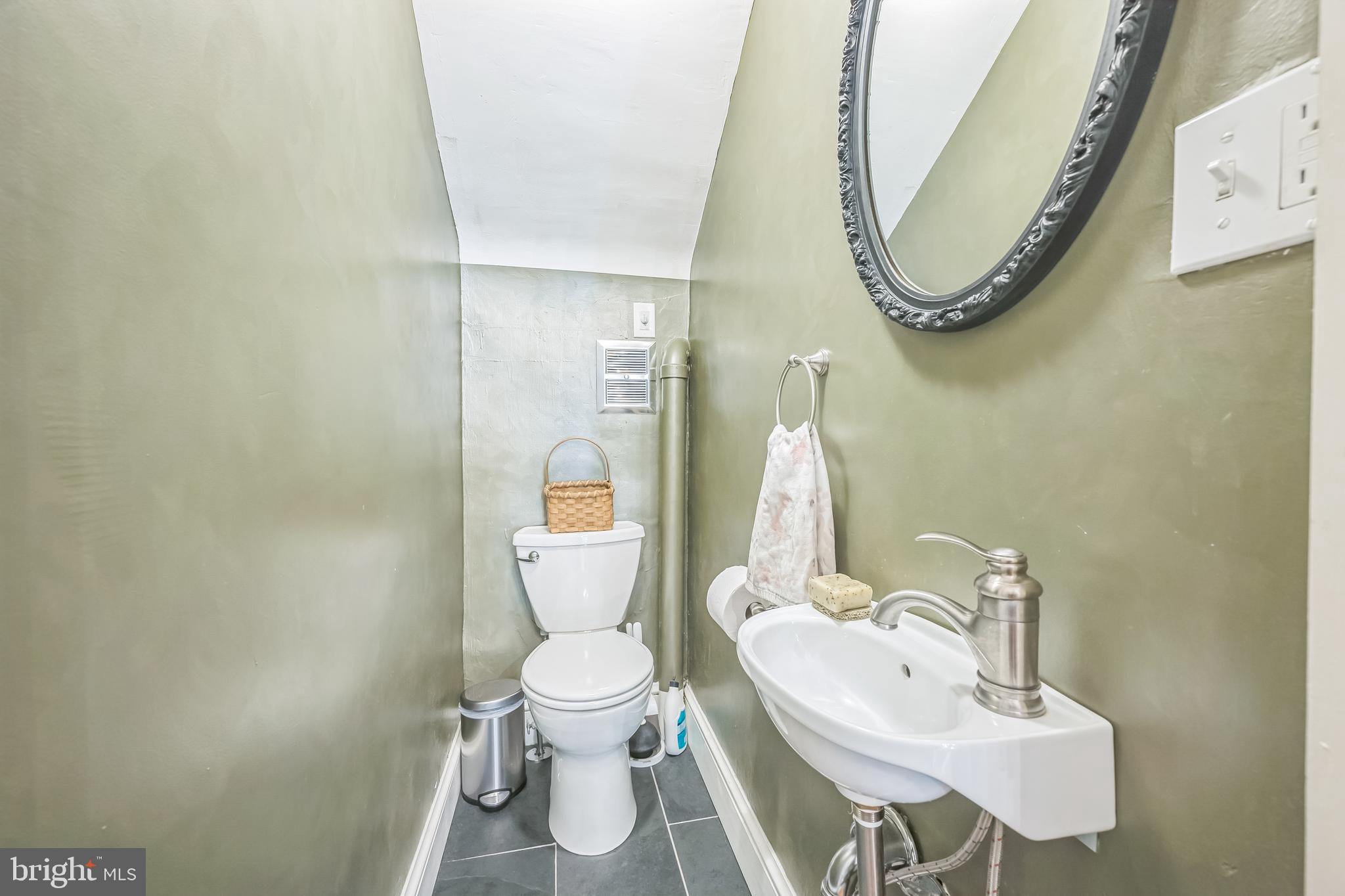 35 Harvard Road Audubon, NJ 08106 - Photo 27 of 36 a bathroom with a toilet sink and mirror