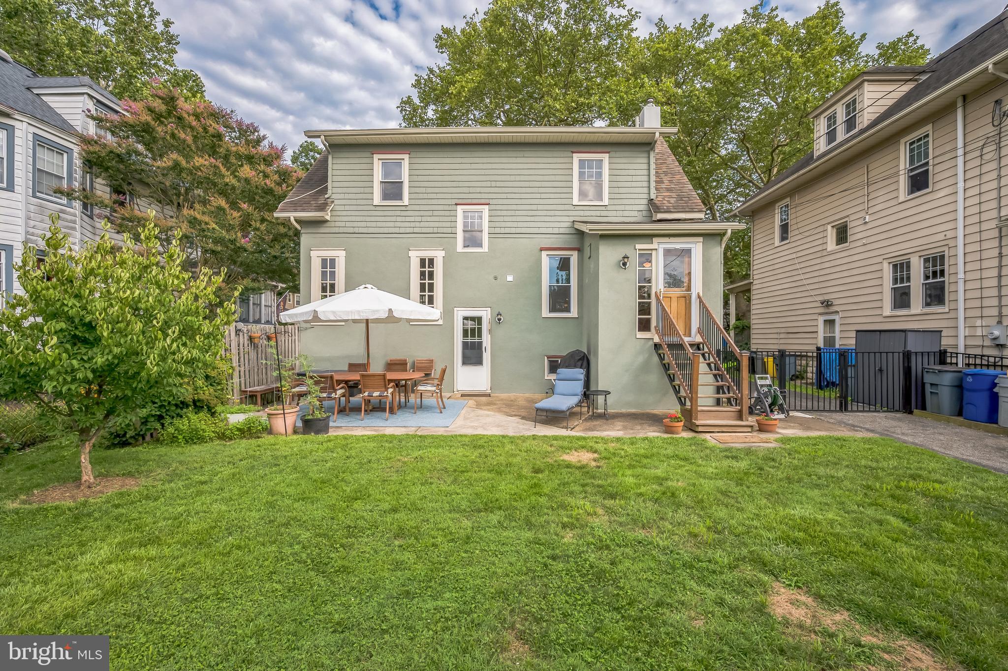 35 Harvard Road Audubon, NJ 08106 - Photo 31 of 36 a front view of a house with patio and garden