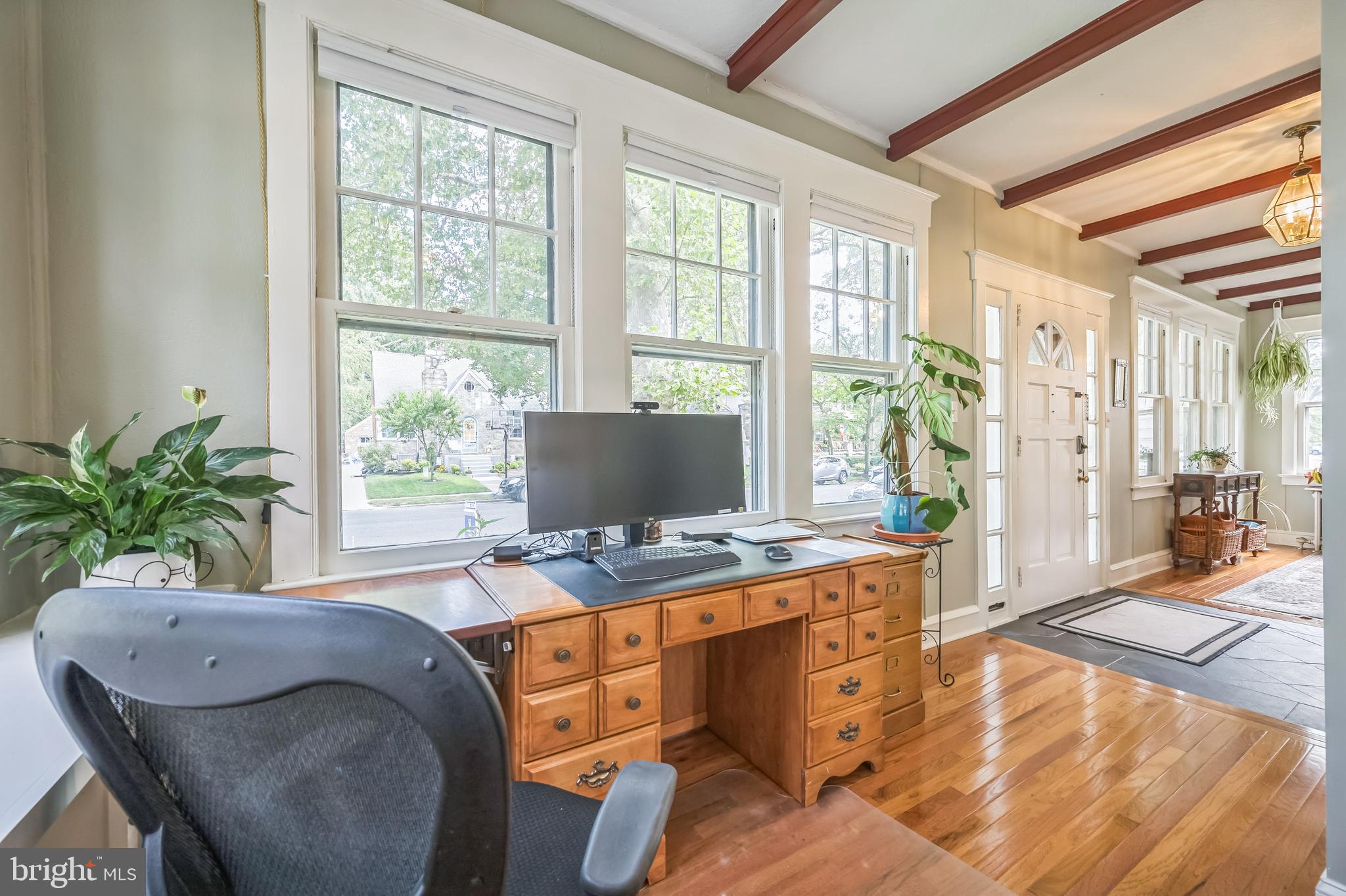 35 Harvard Road Audubon, NJ 08106 - Photo 6 of 36 a living room with furniture and a potted plant