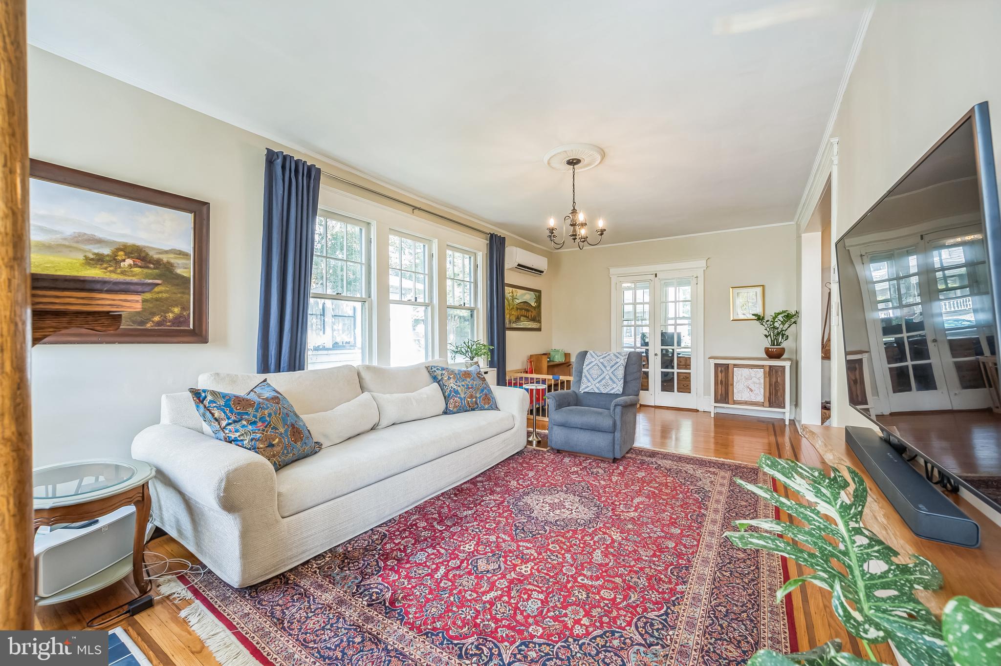 35 Harvard Road Audubon, NJ 08106 - Photo 8 of 36 a living room with furniture and a large window