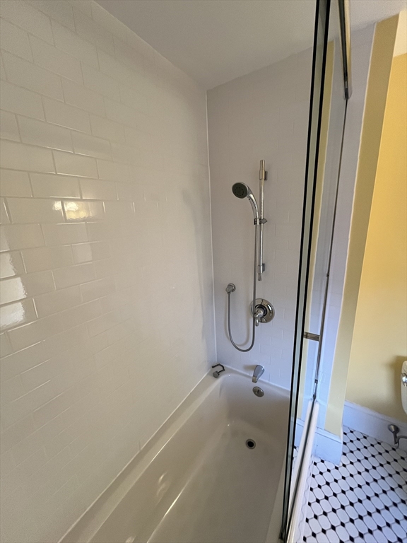 11 Revere Street, Unit 6 Boston, MA 02130 - Photo 13 of 32 a bathroom with a shower
