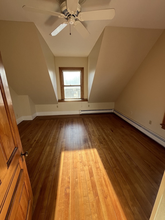 11 Revere Street, Unit 6 Boston, MA 02130 - Photo 14 of 32 a view of empty room with wooden floor and fan