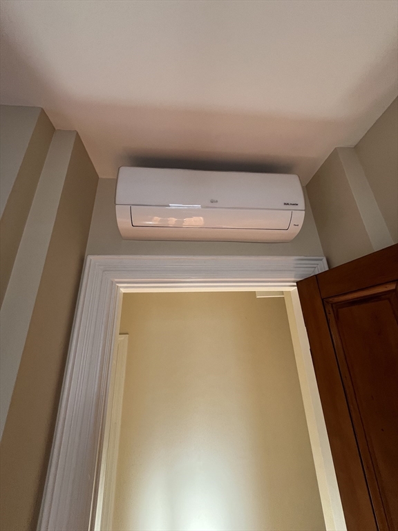 11 Revere Street, Unit 6 Boston, MA 02130 - Photo 17 of 32 a utility room with washer and dryer