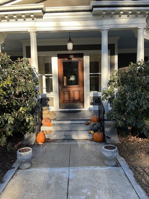 11 Revere Street, Unit 6 Boston, MA 02130 - Photo 2 of 32 a front view of a house with outdoor seating